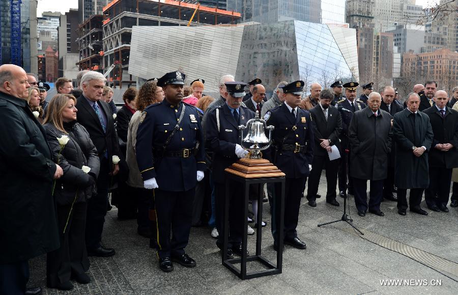 Former New York City Mayor Dinkins (3rd R, Front) and New York City Mayor Bloomberg (2nd R) participate in the 20th anniversary ceremony to commemorate victims of the 1993 World Trade Center bombing attack, at Ground Zero in New York City on Feb. 26, 2013. The bomb explosion with the force of an earthquake rocked the building, killing 6 people and injuring more than 1,000. (Xinhua/Wang Lei) 
