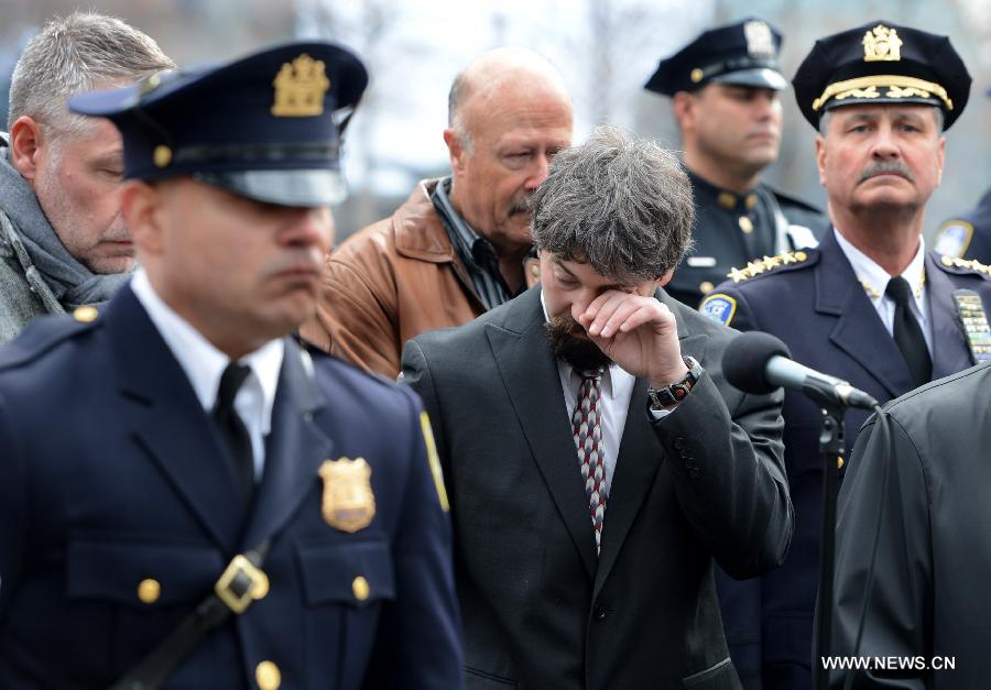 Stephen Knapp, a son of a victim of the 1993 World Trade Center bombing attack, Stephen Knapp, a son of a victim of the 1993 World Trade Center bombing attack, wipes tears from his eyes as he participates in the 20th anniversary ceremony at Ground Zero in New York City on Feb. 26, 2013. The bomb explosion with the force of an earthquake rocked the building, killing 6 people and injuring more than 1,000. (Xinhua/Wang Lei) 