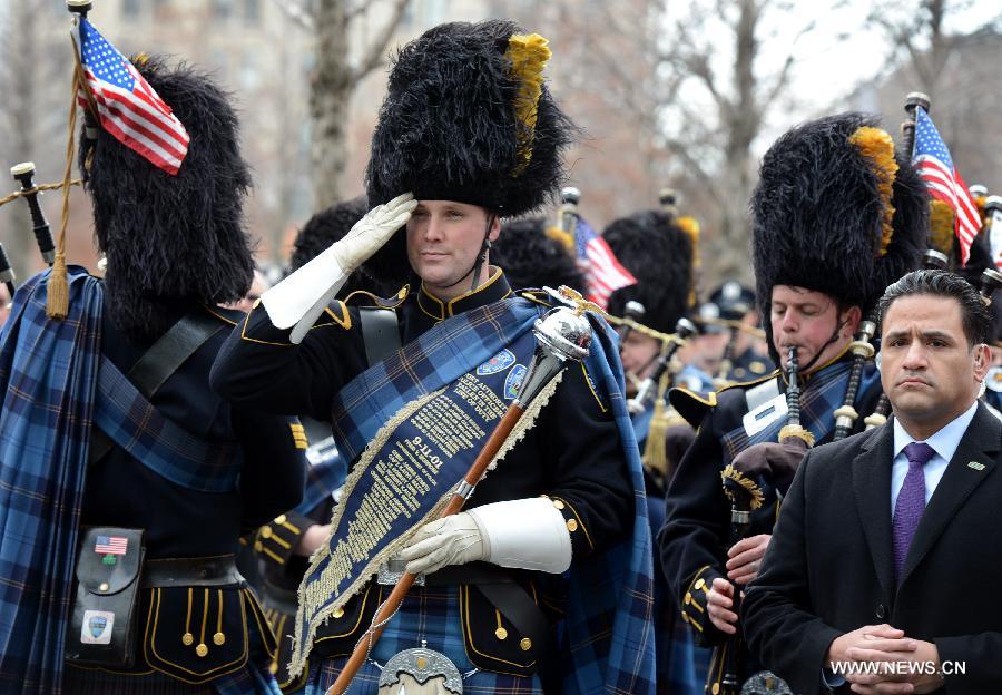 Port Authority Pipes and Drums band participates in the 20th anniversary ceremony to commemorate victims of the 1993 World Trade Center bombing attack, at Ground Zero in New York City on Feb. 26, 2013. The bomb explosion with the force of an earthquake rocked the building, killing 6 people and injuring more than 1,000. (Xinhua/Wang Lei) 