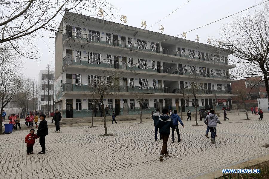 Photo taken on Feb. 27, 2013 shows a dormitory building of the Qinji Elementary School, where a stampede accident took place, in Xueji County of Xiangyang, central China's Hubei Province. Four students were killed in a stampede accident here on Wednesday morning. Relevant departments of Xiangyang have rushed to the scene to carry out rescue efforts, and the injured have been sent to hospital for treatment. The cause of the accident is under investigation. (Xinhua)