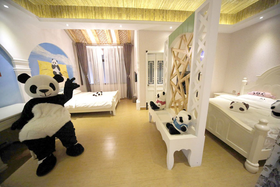 A panda-themed hotel opened in Sichuan on Feb 25, 2013. The interior and exterior of the hotel is fitted with panda-related decorations and is the first panda-themed hotel in the world. (chinanews.com)