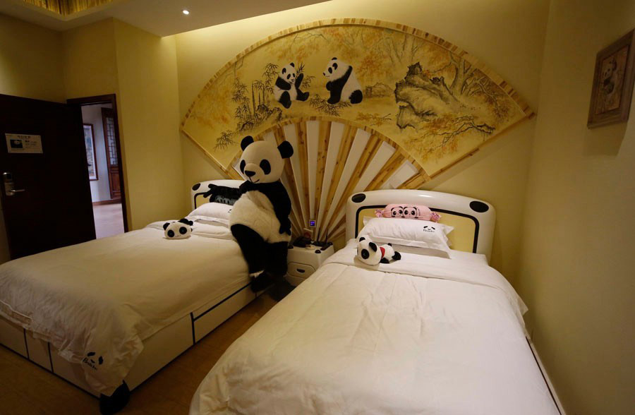 A panda-themed hotel opened in Sichuan on Feb 25, 2013. The interior and exterior of the hotel is fitted with panda-related decorations and is the first panda-themed hotel in the world. (chinanews.com)
