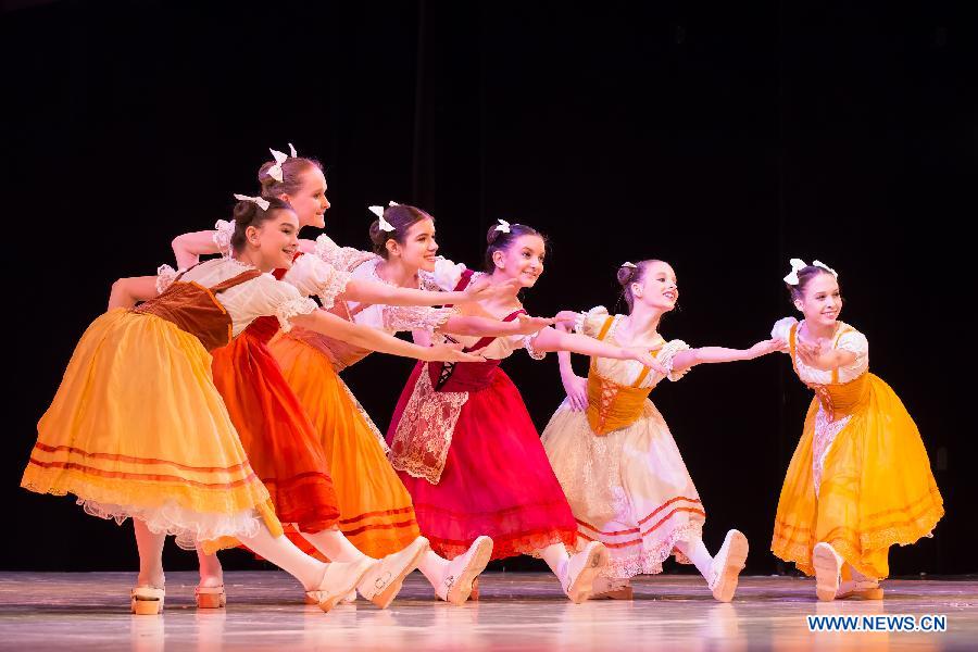 Students of the Hungarian Dance Academy perform on stage in the National Dance Theatre in Budapest, Hungary, on Feb. 27, 2013. (Xinhua/Attila Volgyi) 