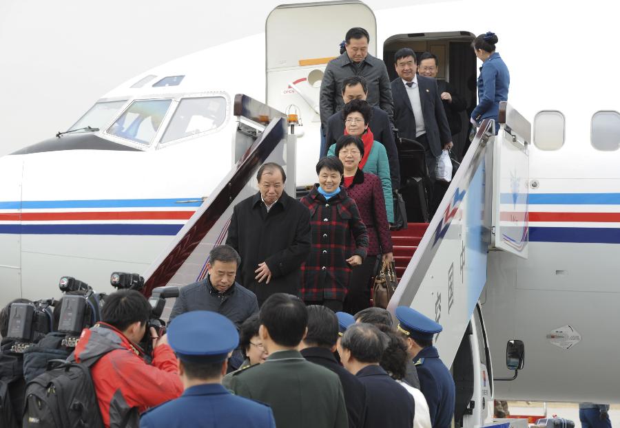 Deputies to the 12th National People's Congress (NPC) from east China's Anhui Province arrive in Beijing, capital of China, March 2, 2013. The first session of 12th NPC is scheduled to open in Beijing on March 5. (Xinhua/Xie Huanchi)