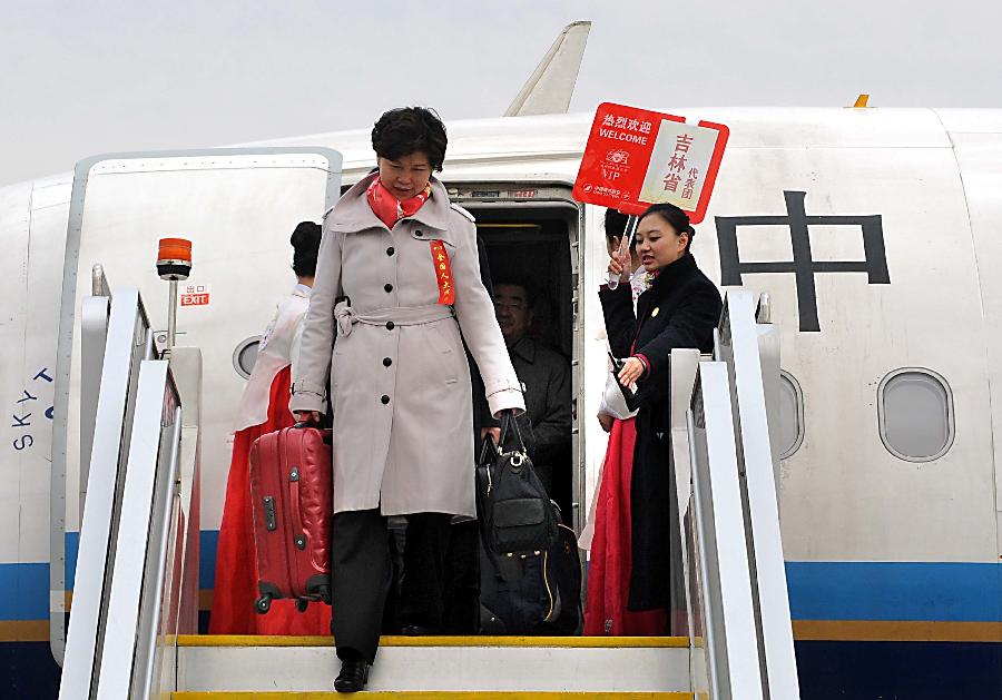 Deputies to the 12th National People's Congress (NPC) from northeast China's Jilin Province arrive in Beijing, capital of China, March 2, 2013. The first session of the 12th NPC is scheduled to open in Beijing on March 5. (Xinhua/Wang Song)