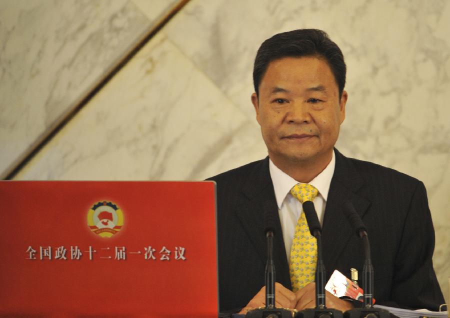 Lu Xinhua, spokesman of the first session of the 12th Chinese People's Political Consultative Conference (CPPCC) National Committee, attends a news conference on the CPPCC session in Beijing, capital of China, March 2, 2013. The first session of the 12th CPPCC National Committee is scheduled to open in Beijing on March 3. (Xinhua/Guo Yu) 