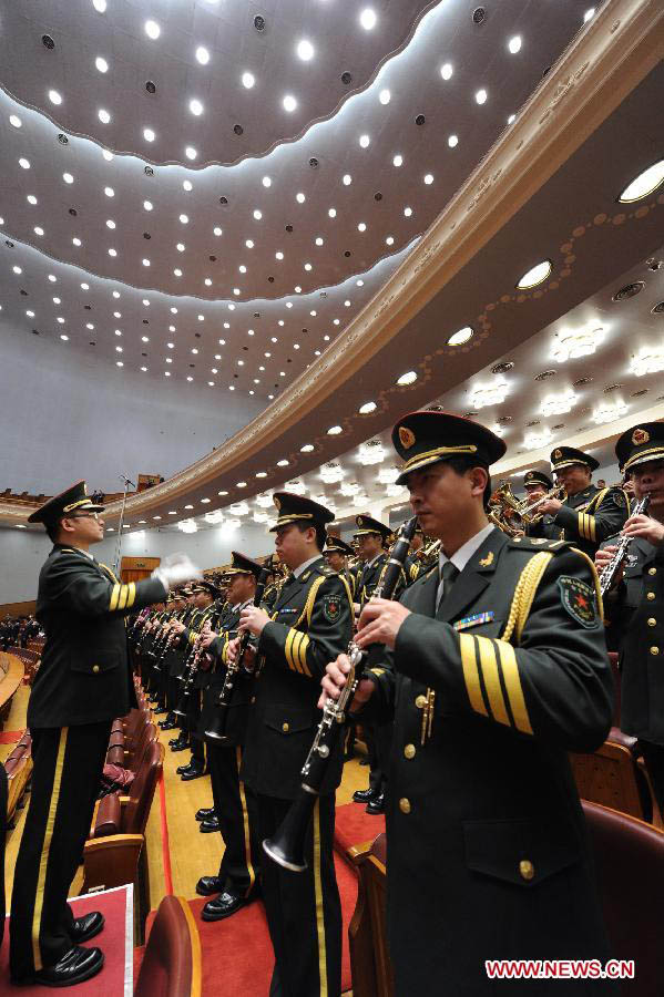 The military band of China's People's Liberation Army plays the national anthem during the opening meeting of the first session of the 12th National Committee of the Chinese People's Political Consultative Conference (CPPCC) at the Great Hall of the People in Beijing, capital of China, March 3, 2013. The first session of the 12th CPPCC National Committee opened in Beijing on March 3.(Xinhua/Rao Aimin)