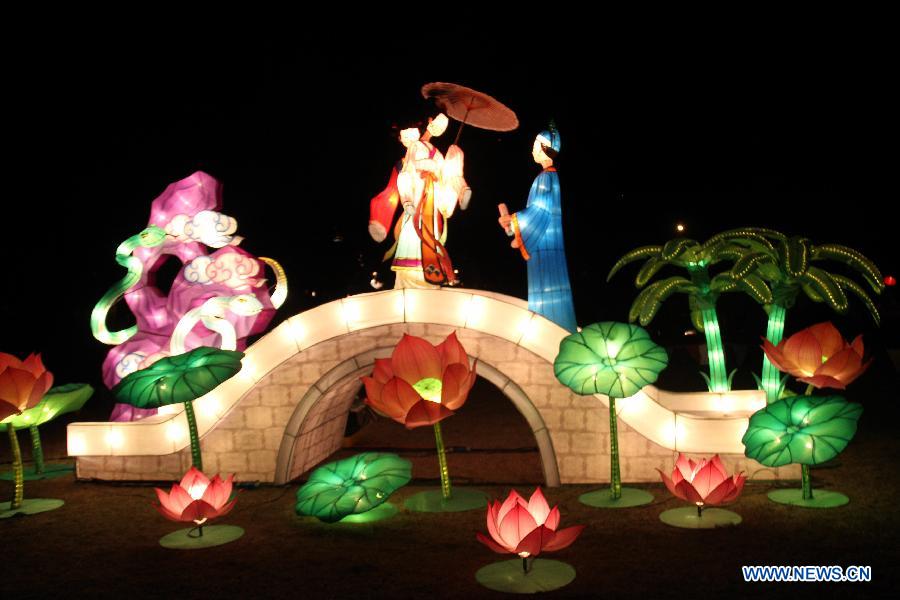 A lantern that references the ancient legend of Madame White Snake, about a young man who falls in love with a beautiful woman, unaware that she is a white snake that has taken on human form, is on display during the celebration of Chinese Lantern Festival in New Zealand's Christchurch, March 2, 2013. Ancient Chinese traditions mingled with contemporary folk-rock, acrobatics and kung fu tea-pouring as the 2013 Christchurch Lantern Festivals welcomed in the Year of the Snake on Saturday. (Xinhua/Huang Xingwei)