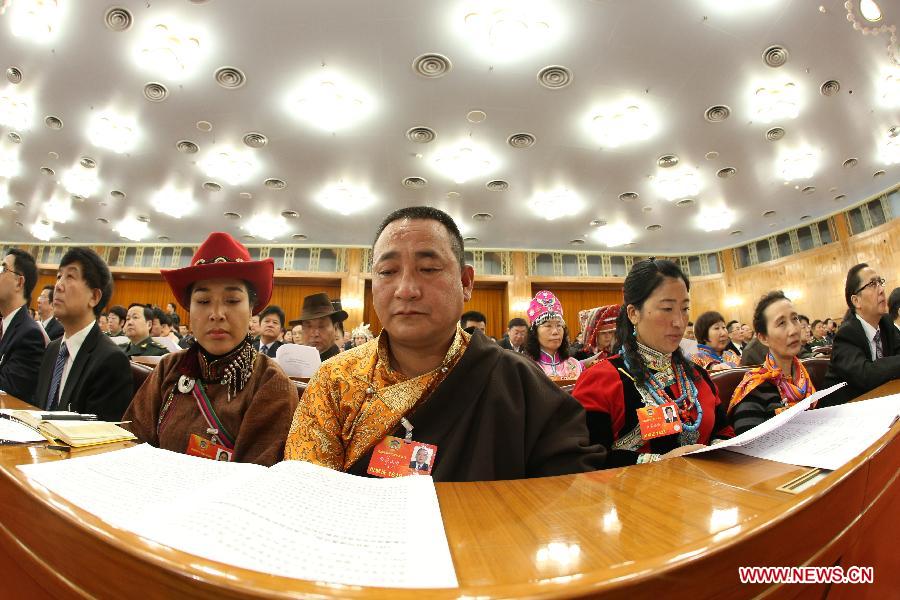 Members of the 12th National Committee of the Chinese People's Political Consultative Conference (CPPCC) attend the opening meeting of the first session of the 12th CPPCC National Committee at the Great Hall of the People in Beijing, capital of China, March 3, 2013. The first session of the 12th CPPCC National Committee opened on March 3. (Xinhua/Chen Jianli)