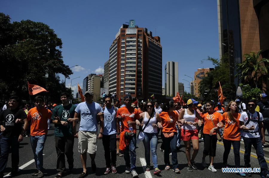 Students and opposers to the Venezuelan President Hugo Chavez participate in a protest held in Caracas, capital of Venezuela, on March 3, 2013. Protestors demanded information about Chavez' state of health. Venezuelan President Hugo Chavez was hospitalized at the Carlos Arvelo Military Hospital since Feb. 18, according to the local press. (Xinhua/Mauricio Valenzuela) 