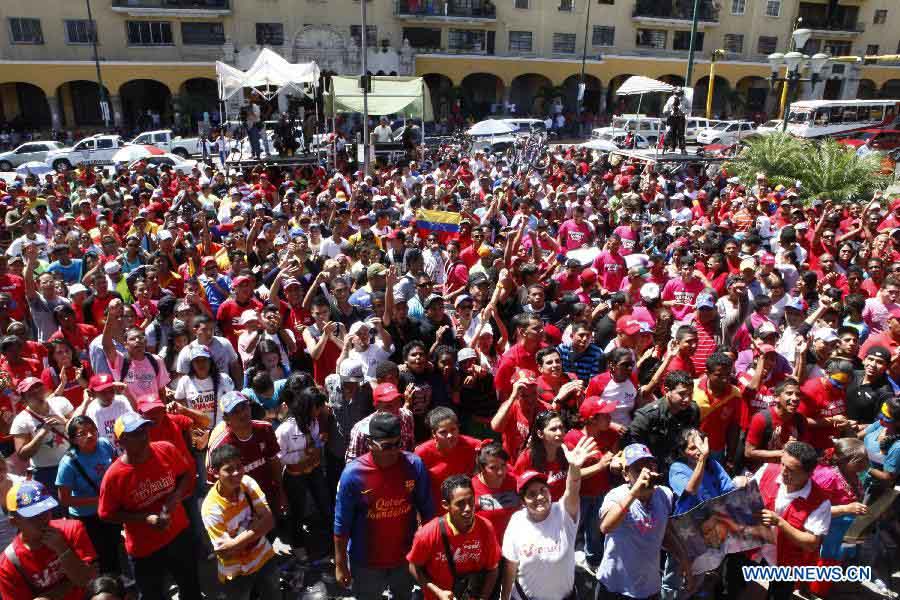 Residents participate in a demonstration in support of Venezuelan President Hugo Chavez at O'Leary Square in Caracas, capital of Venezuela, on March 3, 2013. (Xinhua/AVN) 