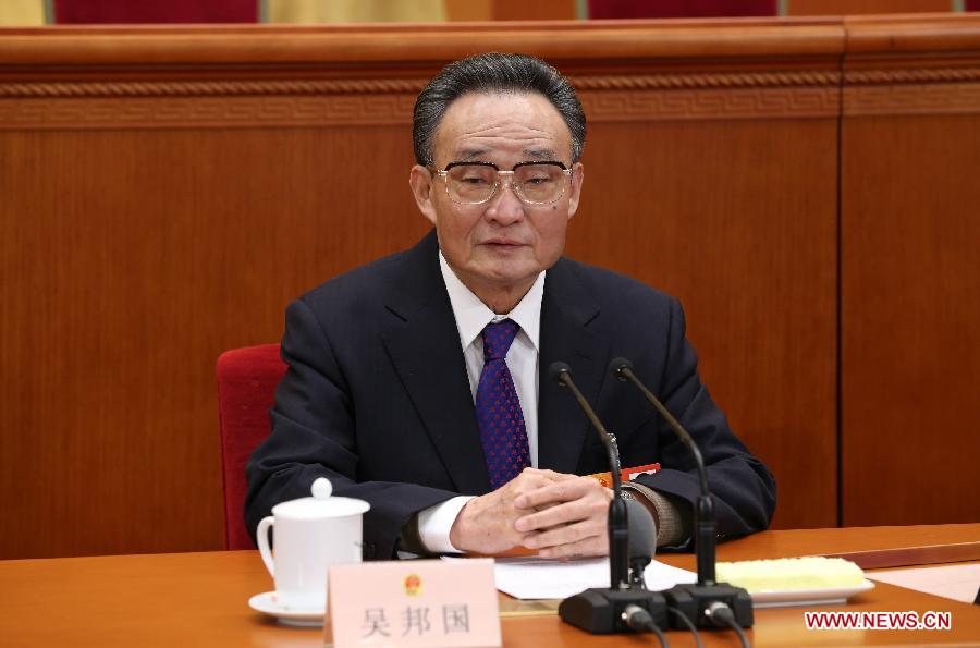 Wu Bangguo presides over the preparatory meeting for the first session of the 12th National People's Congress (NPC) at the Great Hall of the People in Beijing, capital of China, March 4, 2013. (Xinhua/Lan Hongguang) 