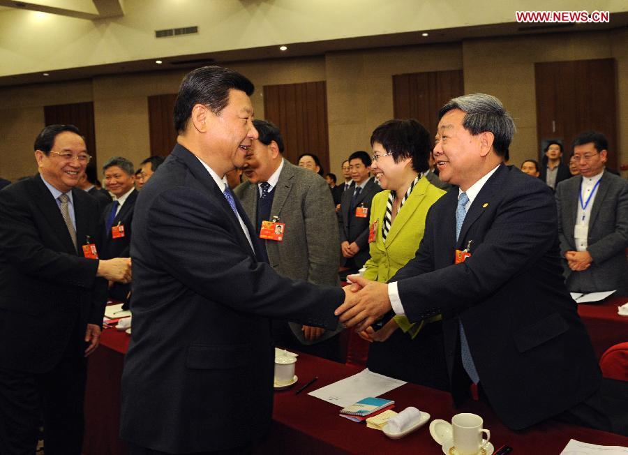 Xi Jinping (L front), general secretary of the Central Committee of the Communist Party of China (CPC) and Chairman of the CPC Central Military Commission, visits members of the 12th National Committee of the Chinese People's Political Consultative Conference (CPPCC) from China Association for Science and Technology as well as science and technology circles and joins their panel discussion in Beijing, capital of China, March 4, 2013. Yu Zhengsheng, a Standing Committee member of the Political Bureau of the CPC Central Committee, who is also the executive chairperson of the presidium of the first session of the 12th CPPCC National Committee, also attended the activity. (Xinhua/Rao Aimin)