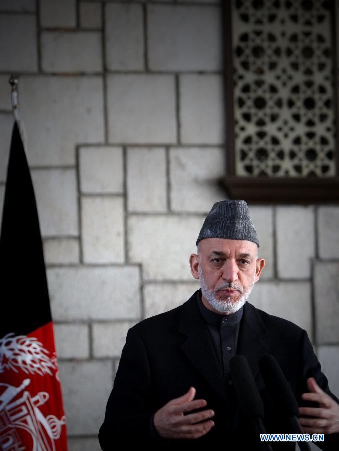 Afghan President Hamid Karzai speaks during a joint press conference with NATO Secretary General Anders Fogh Rasmussen (not seen in the picture) in Kabul, Afghanistan on March 4, 2013. Afghan President Hamid Karzai on Monday termed terrorism as the common enemy of Afghanistan and Pakistan and sought firm anti-terror support from Islamabad. (Xinhua/Ahmad) 
