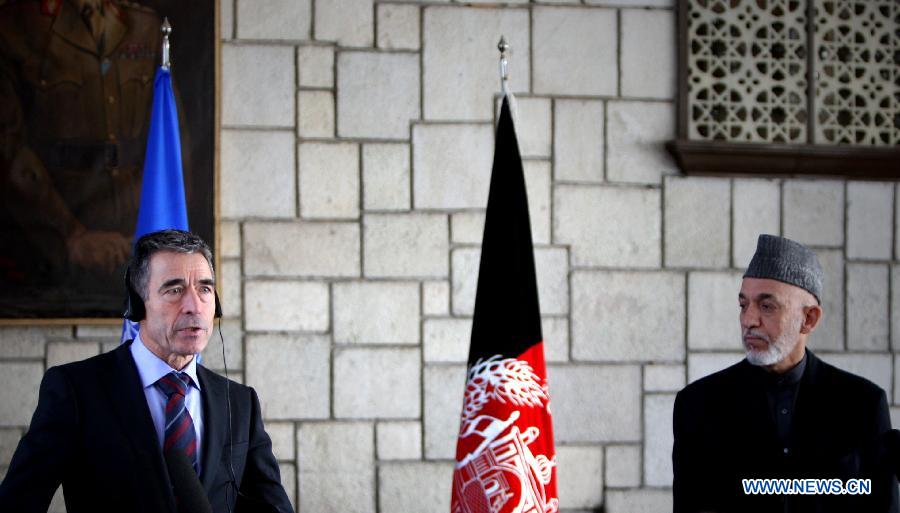 NATO Secretary General Anders Fogh Rasmussen (L) speaks during a joint press conference with Afghan President Hamid Karzai in Kabul, Afghanistan on March 4, 2013. Afghan President Hamid Karzai on Monday termed terrorism as the common enemy of Afghanistan and Pakistan and sought firm anti-terror support from Islamabad. (Xinhua/Ahmad) 