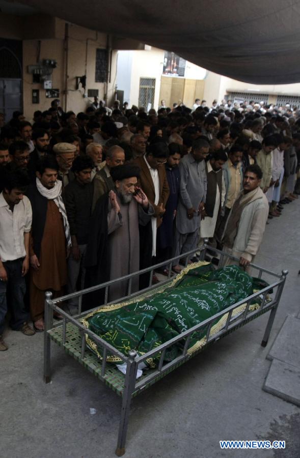 Pakistani Shiite Muslims attend the funeral of a victim of Karachi blast in northwest Pakistan's Peshawar, March 4, 2013. A suspected suicide bomber attacked Shiite Muslims in Pakistan's commercial capital Karachi on March 3, killing at least 45 people and wounding 150. (Xinhua/Umar Qayyum) 