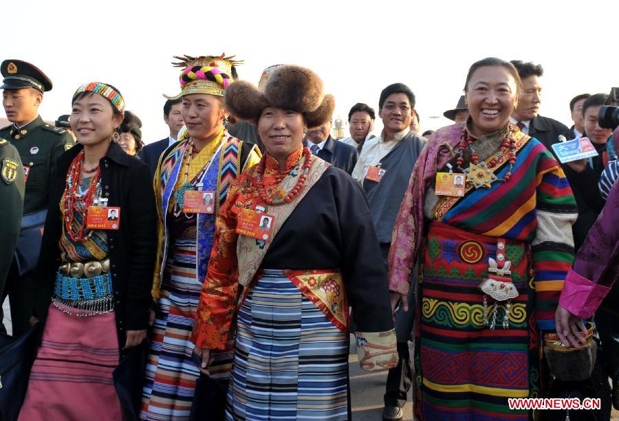 Deputies to the 12th National People's Congress (NPC) arrive at Tian'anmen Square in Beijing, capital of China, March 5, 2013. The first session of the 12th National People's Congress (NPC) will open at the Great Hall of the People in Beijing on March 5. (Xinhua/Guo Chen) 