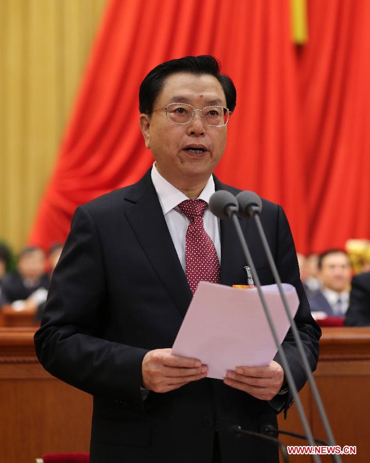 Zhang Dejiang presides over the opening meeting of the first session of the 12th National People's Congress (NPC) at the Great Hall of the People in Beijing, capital of China, March 5, 2013. (Xinhua/Lan Hongguang)
