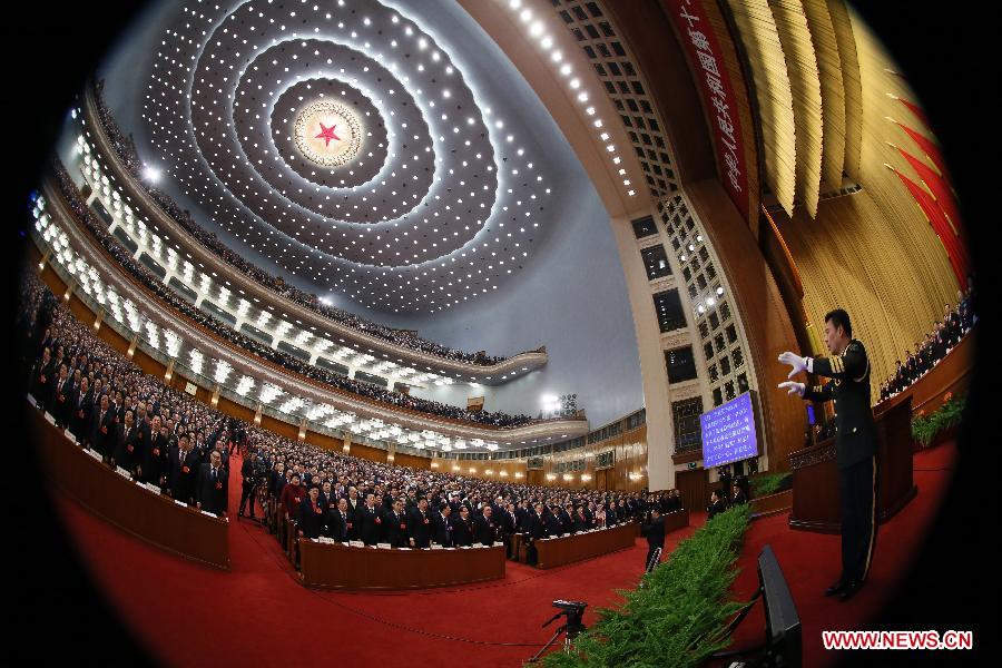 Deputies sing the national anthem during the opening meeting of the first session of the 12th National People's Congress (NPC) at the Great Hall of the People in Beijing, capital of China, March 5, 2013. (Xinhua/Lan Hongguang)