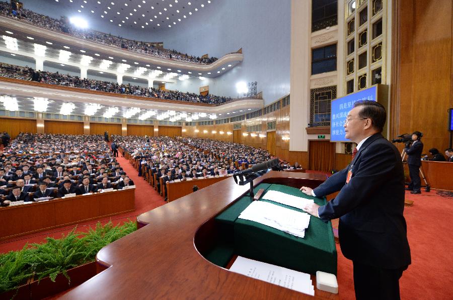Chinese Premier Wen Jiabao delivers the government work report during the opening meeting of the first session of the 12th National People's Congress (NPC) at the Great Hall of the People in Beijing, capital of China, March 5, 2013. (Xinhua/Ma Zhancheng)
