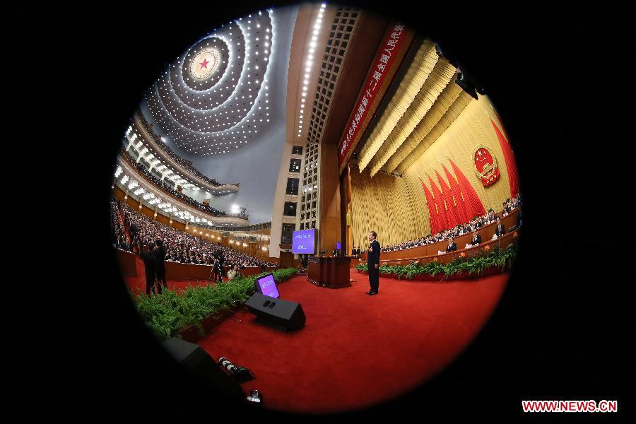 The first session of the 12th National People's Congress (NPC) opens at the Great Hall of the People in Beijing, capital of China, March 5, 2013. (Xinhua/Lan Hongguang) 