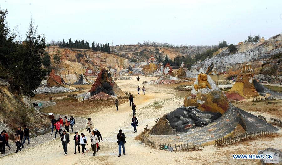 Tourists visit the Shalin scenic area in Luliang County, southwest China's Yunnan Province, March 4, 2013. With various geological wonders, Shalin scenic area has long been a tourist attraction. (Xinhua/Chen Haining)
