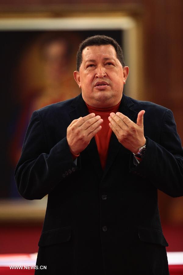 Image provided by the Presidency of Venezuela on Sept. 4, 2012 shows President Hugo Chavez participating in the delivery of aid in petro-orinco bonds to beneficiaries of basic and secondary education at the Palace of Miraflores, Caracas, capital of Venezuela. Venezuelan President Hugo Chavez died on March 5, 2013 at 16:25 (local time), according to nationally broadcast message by Venezuelan Vice President Nicolas Maduro. (Xinhua/Presidency of Venezuela) 