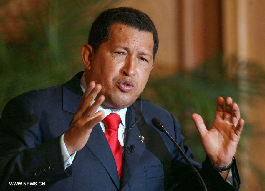 File photo taken on Oct. 17, 2006 shows Venezuelan President Hugo Chavez delivering a speech in Caracas, Venezuela. Venezuelan government confirmed President Hugo Chavez's death on March 5, 2013. (Xinhua) 