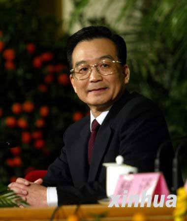 Then-newly elected Premier Wen Jiabao meets the press at the Great Hall of the People in Beijing on March 18, 2003. (Xinhua File Photo)