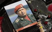 Thousands march with Chavez coffin