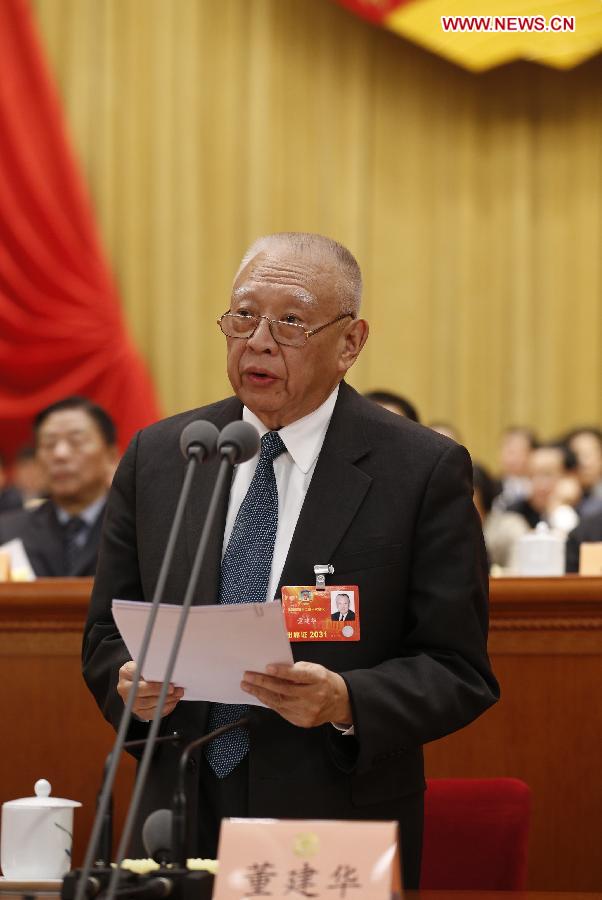Tung Chee-hwa presides over the second plenary meeting of the first session of the 12th National Committee of the Chinese People's Political Consultative Conference (CPPCC) at the Great Hall of the People in Beijing, capital of China, March 7, 2013. (Xinhua/Ju Peng)  