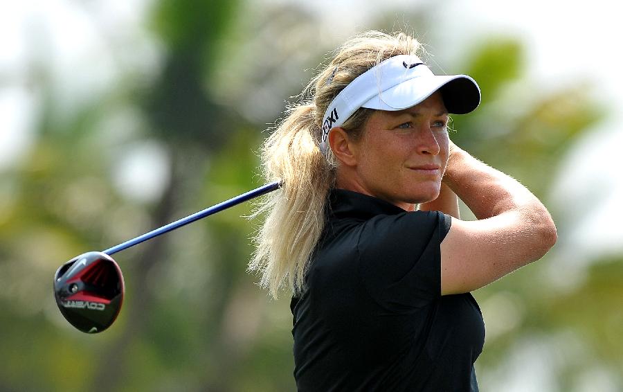 Suzann Pettersen of Norway competes in the 2013 World Ladies Golf Championship in Haikou, capital of south China's Hainan Province, March 7, 2013. A total of 109 golfers around the world participated in the championship. (Xinhua/Guo Cheng) 