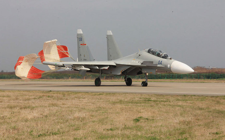 Chinese navy's Su-30MKK2 fighters in attack training