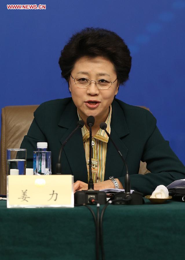 Jiang Li, a member of the 12th National Committee of the Chinese People's Political Consultative Conference (CPPCC), speaks at a press conference held by the first session of the 12th CPPCC National Committee in Beijing, capital of China, March 8, 2013. Invited CPPCC members answered questions on improvements in political consultative system at the press conference. (Xinhua/Wang Shen)