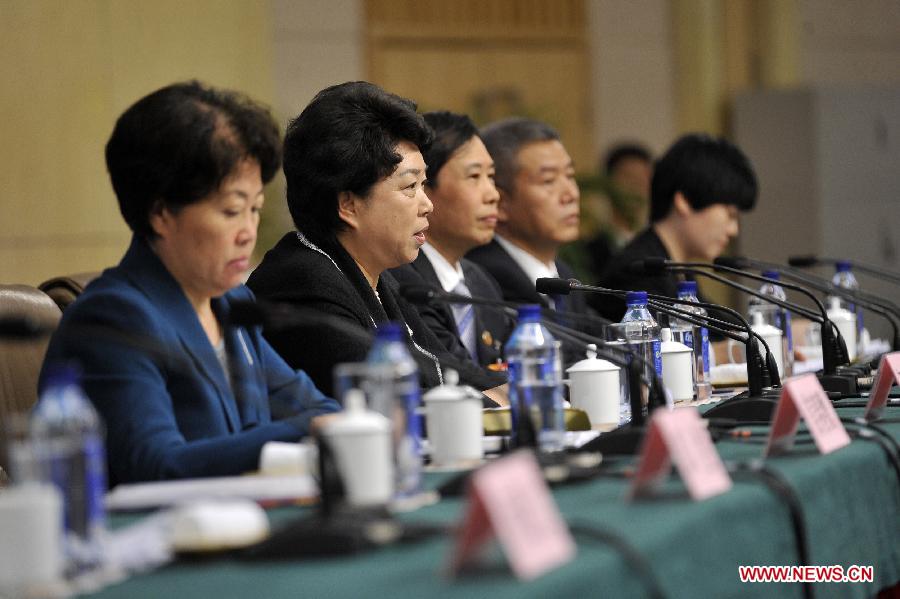 He Yehui (2nd L), vice general-secretary of the National People's Congress (NPC) Standing Committee, answers questions at a news conference on NPC's work held by the first session of the 12th NPC at the Great Hall of the People in Beijing, China, March 9, 2013. (Xinhua/Wang Peng)