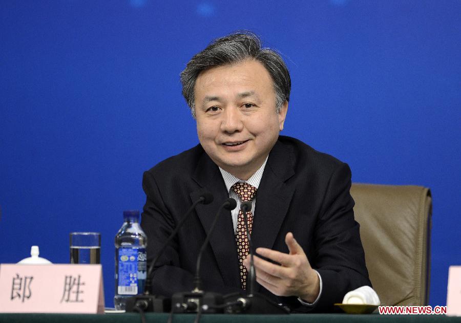 Lang Sheng, deputy director of the Legislative Affairs Commission of the National People's Congress (NPC) Standing Committee, answers questions at a news conference on NPC's work held by the first session of the 12th NPC at the Great Hall of the People in Beijing, China, March 9, 2013. (Xinhua/Wang Peng)