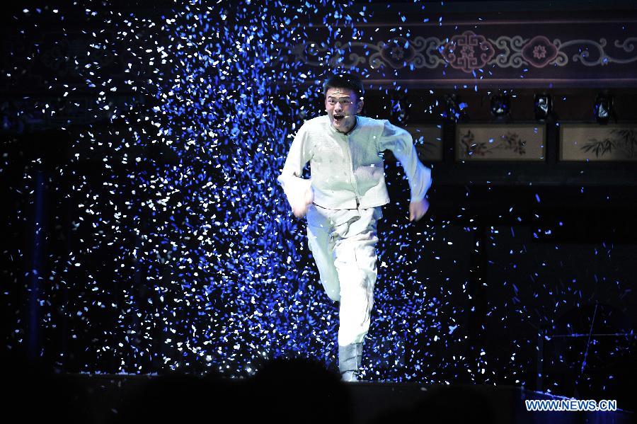 An actor performs in a drama in Pingyao of north China's Shanxi Province, March 9, 2013. (Xinhua/Zhan Yan) 