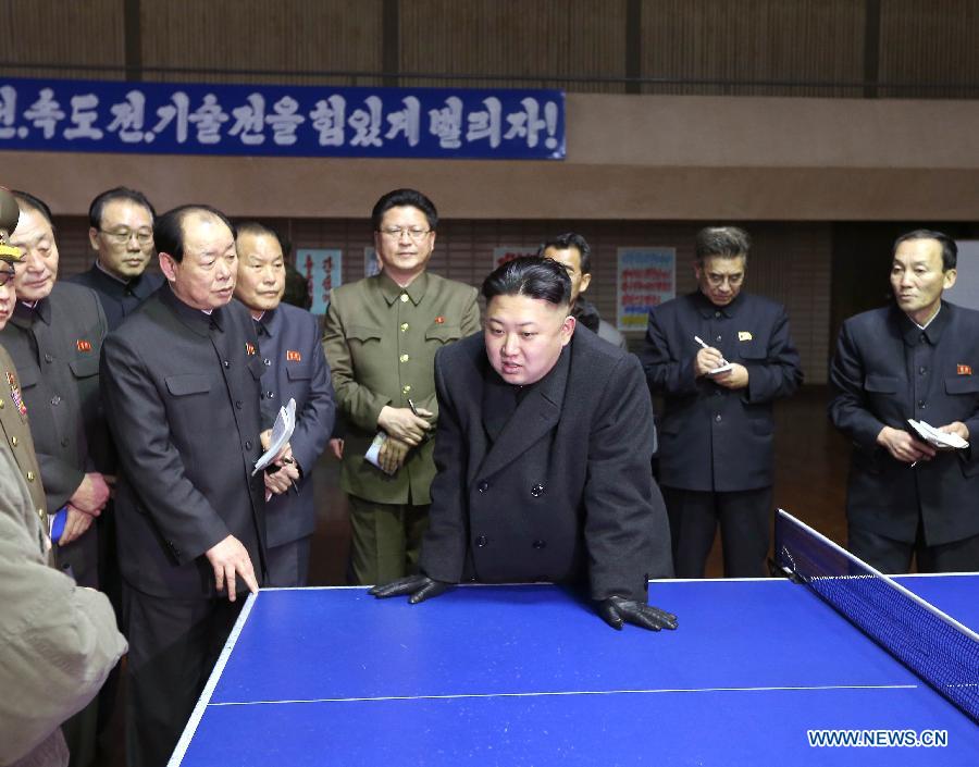 Photo released by Korean Central News Agency (KCNA) on March 9, 2013 shows top leader of the Democratic People's Republic of Korea (DPRK) Kim Jong Un (C) inspecting the sports village in Chongchun Street, March 8, 2013. The village was built on the occasion of the 40th anniversary of the founding of the DPRK. It is a comprehensive sports and cultural centre with gymnasiums, sports persons' restaurant, hotels and welfare service facilities. (Xinhua/KCNA) 