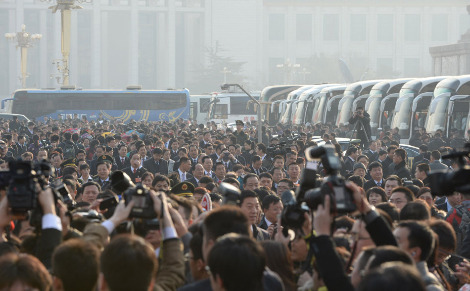 Deputies from all around China arrive in Tiananmen Square for the first session of the 12th National People's Congress, March 5, 2013. (Xinhua/Chen Shugen)