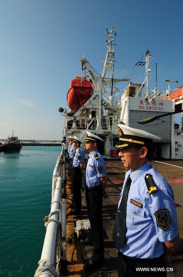 Chinese marine surveillance ship Haijian 83 leaves the Yongxing Wharf in China's southernmost Sansha City to carry out regular patrolling and observation missions including the management of maritime space and protection of marine ecology and islands, March 10, 2013. (Xinhua/Wei Ye) 