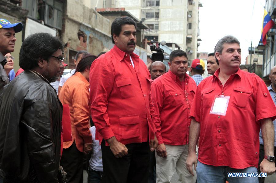 Acting President Nicolas Maduro (C) attends the XII Venezuela's National Party Congress in Caracas, capital of Venezuela, on March 10, 2013. Venezuela's National Electoral Council (CNE) announced on Saturday after a special meeting of its Board of Directors that the presidential elections will be held on April 14. (Xinhua/AVN) 