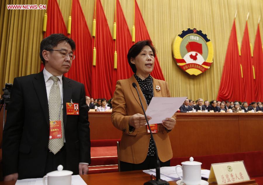 The head of the intendancy announces voting rules at the fourth plenary meeting of the first session of the 12th National Committee of the Chinese People's Political Consultative Conference (CPPCC) held at the Great Hall of the People in Beijing, capital of China, March 11, 2013. Chairman, vice-chairpersons, secretary-general and Standing Committee members of the 12th CPPCC National Committee will be elected here on Monday afternoon. (Xinhua/Ju Peng)