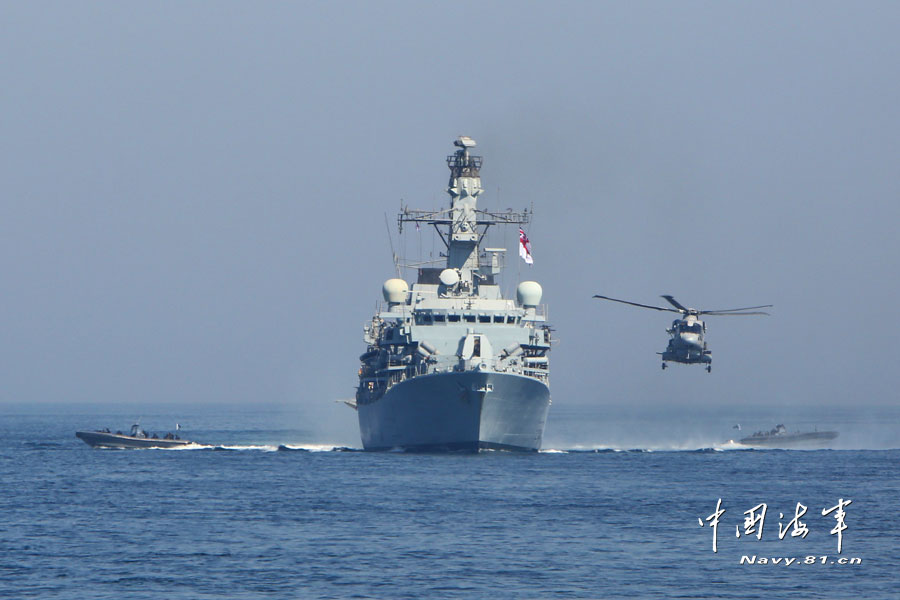 24 warships from 14 countries including China, Pakistan, the United States, the United Kingdom and Japan participate in the "Peace-13" multinational maritime joint military exercise and conduct live-ammunition firing training on the sea on March 7, 2013. (navy.81.cn/Wang Changsong)