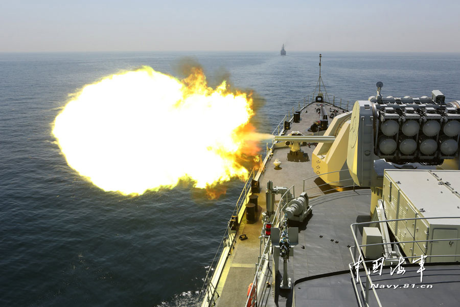 24 warships from 14 countries including China, Pakistan, the United States, the United Kingdom and Japan participate in the "Peace-13" multinational maritime joint military exercise and conduct live-ammunition firing training on the sea on March 7, 2013. (navy.81.cn/Wang Changsong)