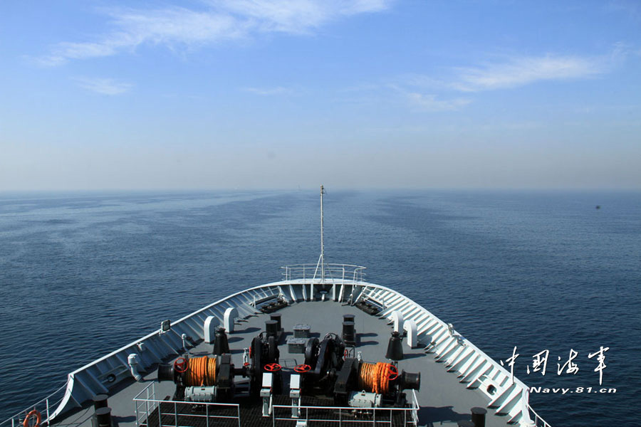 24 warships from 14 countries including China, Pakistan, the United States, the United Kingdom and Japan participate in the "Peace-13" multinational maritime joint military exercise and conduct live-ammunition firing training on the sea on March 7, 2013. (navy.81.cn/Wang Changsong)