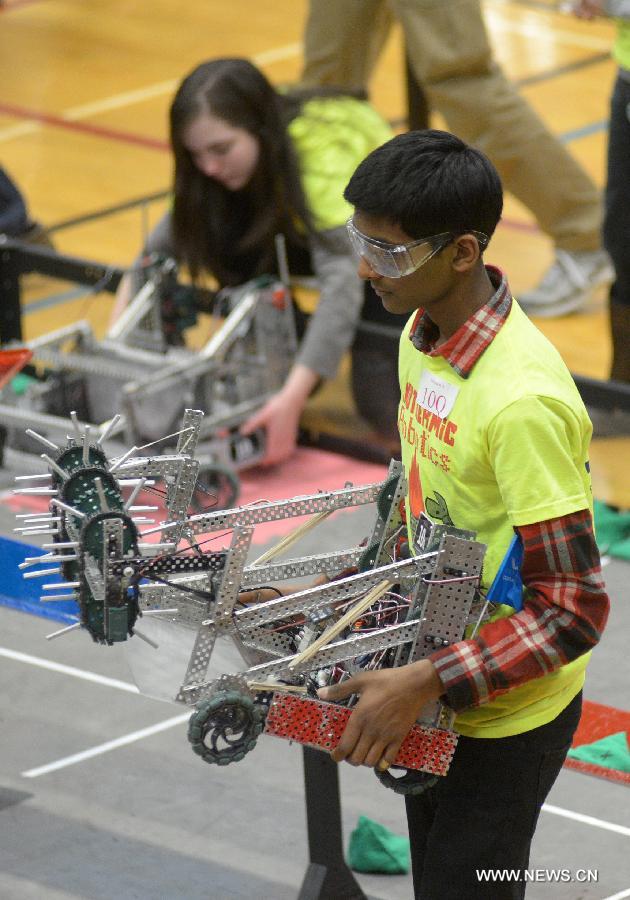 Students from over 96 high-schools across North America compete in 2013 VEX Robotics Competition at British Columbia Institute of Technology (BCIT) in Burnaby, BC, Canada on March 9, 2013. Using VEX Robotics Design System, competing teams, with guidance from their teachers and mentors, build the most innovative robots possible, working together to score the most points against opposing teams. This is the qualifying event for the upcoming 2013 VEX Robotics Competition World Championship being held in Anaheim, April 17-20, 2013. (Xinhua/Sergei Bachlakov) 