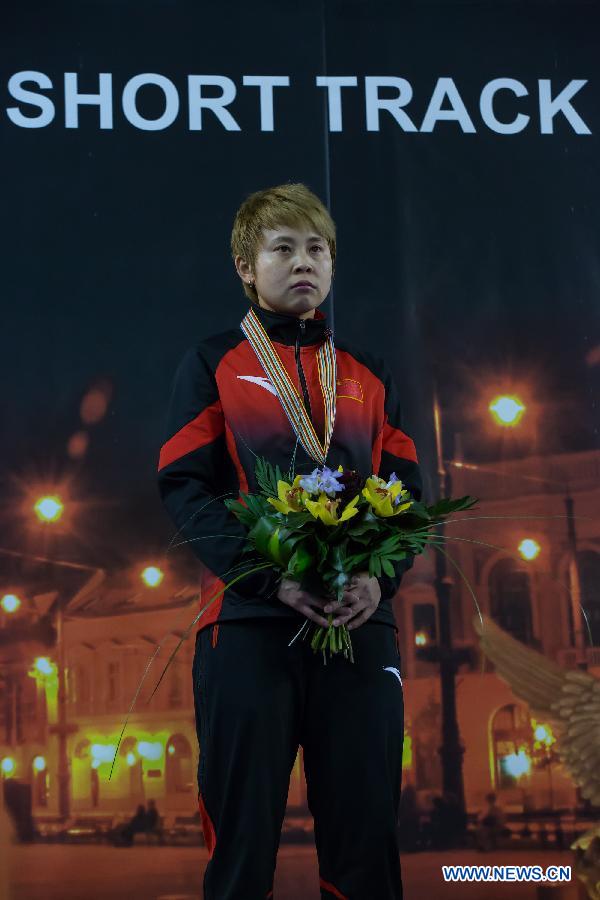 Gold medalist Wang Meng of China poses during the ceremony after winning the women's 1000m final at the ISU World Short Track Speed Skating Championships in Debrecen, Hungary, on March 10, 2013. Wang Meng won the gold medal with 1 minute and 31.549 seconds.(Xinhua/Attila Volgyi) 