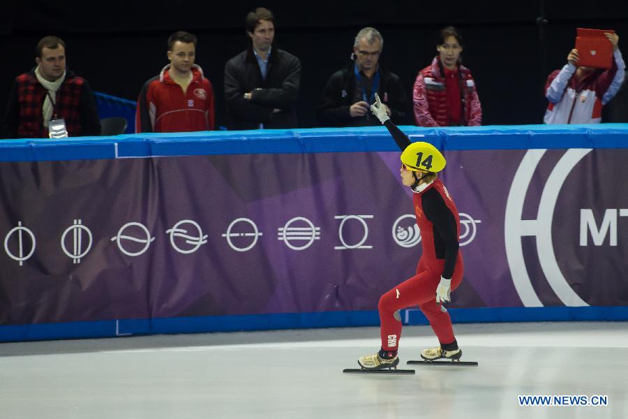 China's Wang Meng celebrates during the women's 3000m relay final at the ISU World Short Track Speed Skating Championships in Debrecen, Hungary, on March 10, 2013. China won the gold medal with 4 minutes and 14.104 seconds.(Xinhua/Attila Volgyi) 