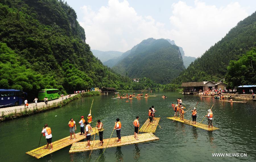 Photo taken on July 19, 2009 shows the scenery of Sixi scenic spot in Zigui County of central China's Hubei Province. China's Arbor Day, or Planting Trees Day, which falls on March 12 each year, is an annual compaign to encourage citizens to plant and care for trees. (Xinhua/Zheng Jiayu) 