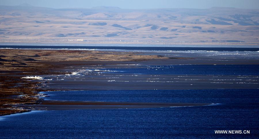 Photo taken on Dec. 13, 2012 shows the scene of Qinghai Lake in Xining, capital of northwest China's Qinghai Province. With investment and protection from State Government and Qinghai government, the level of Qinghai lake continues to rise and the area of the lake has been increasing year after year. Qinghai Lake covered an area of 4,317 square kilometers in 2008, which increased 4,354 square kilometers in 2012. The growth equals 6 times the area of West Lake, a famous lake in east China's Zhejiang Province. (Xinhua/Wang Bo) 